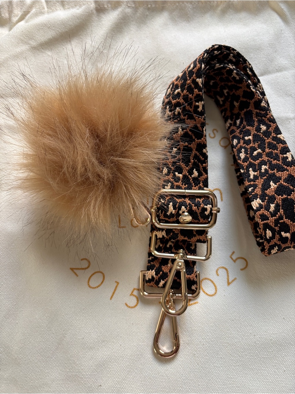 Pom Pom London Leopard Print Strap with Tan Faux Fur Pom Pom